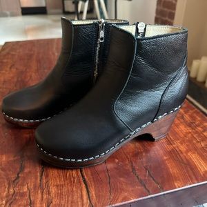 Black leather clog boots by Maguba